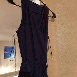 Navy romper, pants to the ankles